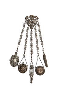 1880Â’s Elaborate Silver Plated German Chatelaine: 1880Â’s Elaborate silver plated German chatelaine with glass perfume bottle (lacking stopper) in metal frame, compact, coin purse, pocketknife, note pad. 12 in.