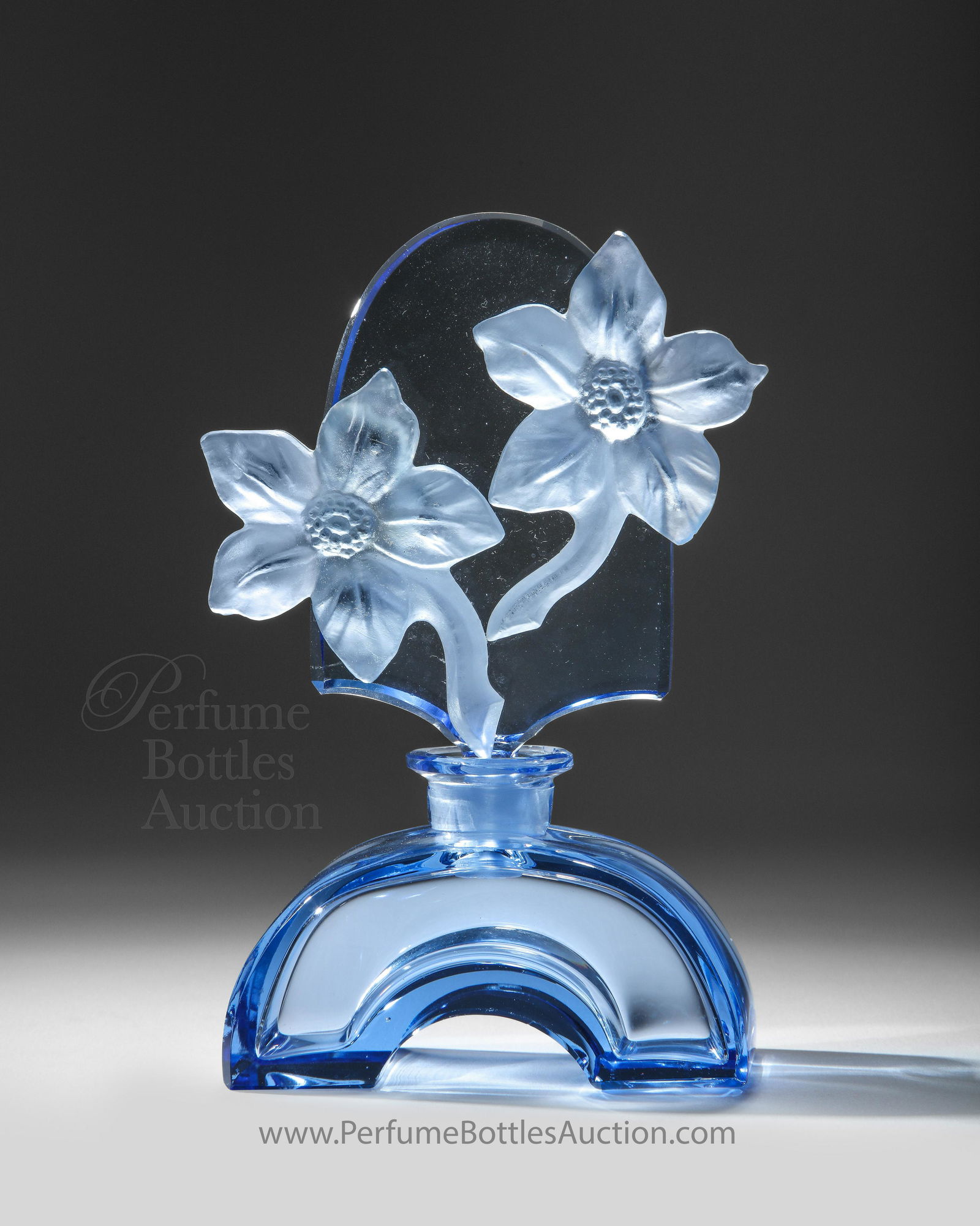 1930s Czechoslovakia, Rare Hoffmann Perfume Bottle,: 1930s rare Czechoslovakian, pale blue crystal perfume bottle, matching stopper with large applied frost crystal flowers. 5 1/2 in. The use of large applied glass to decorate perfume bottles is consist