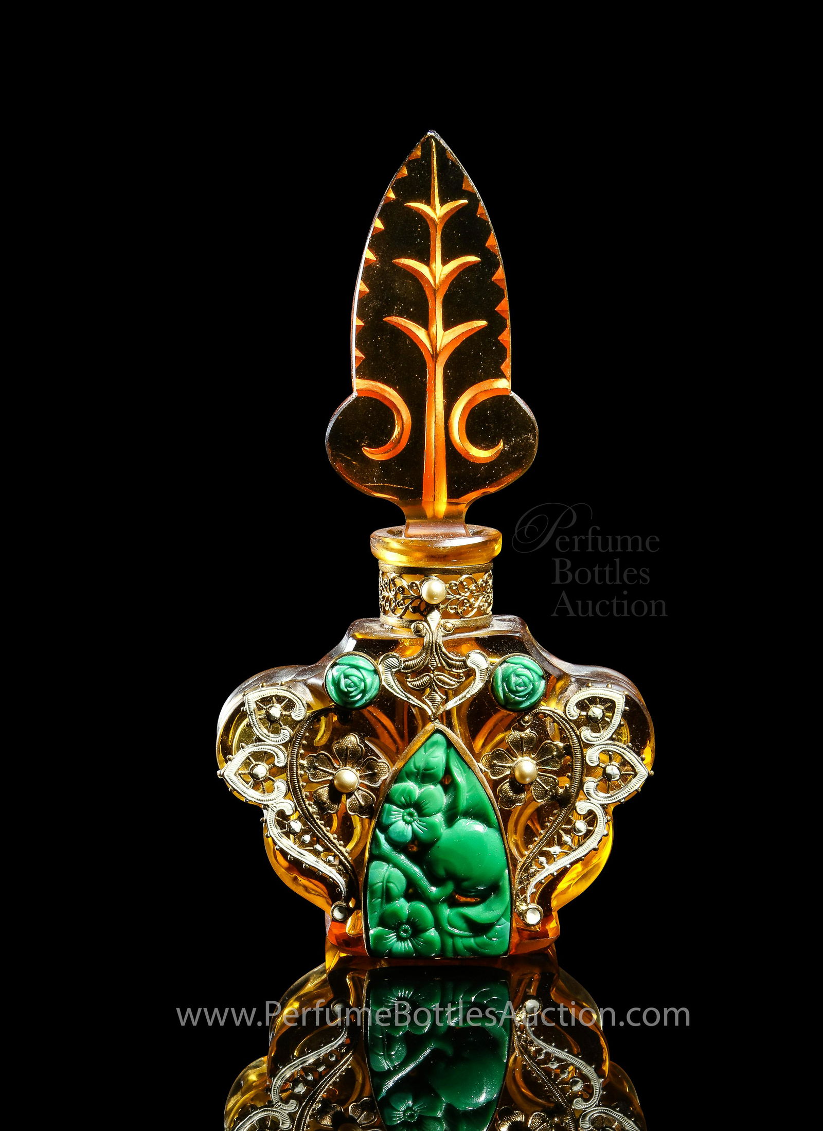 c1930 Czechoslovakian, Curt Schlevogt Ingrid perfume: c1930 Czechoslovakian, Curt Schlevogt “Ingrid line” amber crystal perfume bottle and intaglio stopper, lacy enameled metalwork, jade-glass jewels. 5 1/2 in.