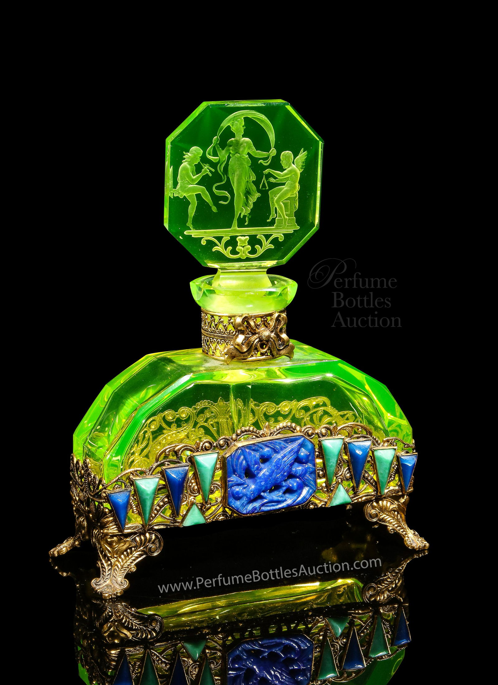 1920s Czechoslovakian Hoffmann vaseline perfume bottle: 1920s Czechoslovakian, Heinrich Hoffmann vaseline crystal perfume bottle and intaglio stopper, faux lapis and jade-glass jeweled gilt metalwork by Neiger Bros. 4 3/4 in.