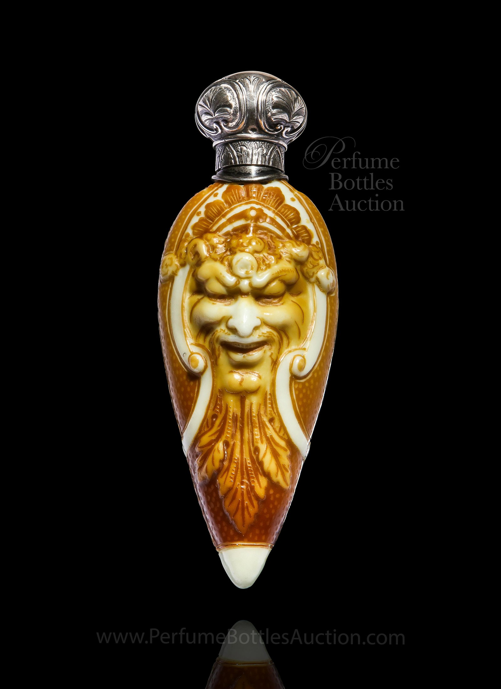 1885 Stevens & Williams dolce relievo cameo Glass scent: 1885 Stevens and Williams ‘dolce relievo’ scent bottle, ivory color art glass, cinnamon patina, classic bearded masks front and reverse, silver mount, pressure screw cap. *Stevens and Williams wer