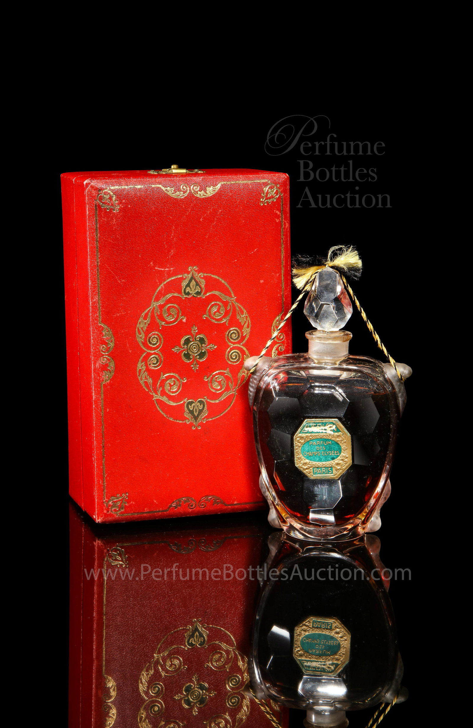 1904 Baccarat Perfume Bottle for Guerlain Champs: 1904 Baccarat for Guerlain Champs Elysees figural turtle crystal perfume bottle and stopper, grey patina, cord, label, box. Baccarat mark. Frozen Stopper. 4 1/4 in.