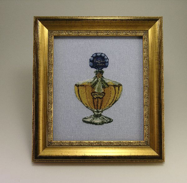 Guerlain Shalimar Miniature Stitched Embroidery: 1. 2009 Guerlain Shalimar miniature cross stitch embroidery (900 stitches to the inch) depicting the iconic 1925 Baccarat bottle. Donated by the artist Janet Ziffer Wells to honor her husband Gareth,