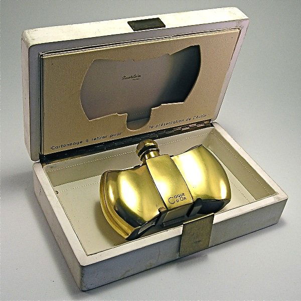 Baccarat 1937 Guerlain Coque D'Or Bottle: 238. Baccarat 1937 Guerlain Coque D'Or perfume bottle and stopper in cobalt crystal with gilt finish, box. 3 1/2 in.