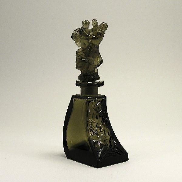 Vintage 1930s Ingrid Czech Perfume Bottle: 343. 1930s Ingrid perfume bottle and stopper in smoke grey crystal, the stopper a couple dancing, dauber stub. 6 in.