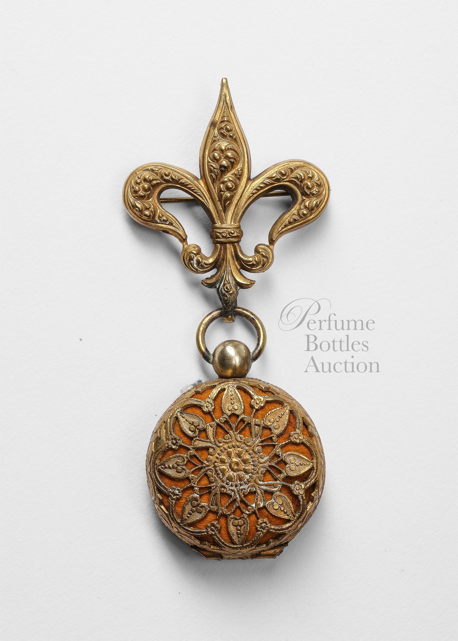 C1900 Ricksecker Orizada brooch vinaigrette: c1900 Ricksecker Orizada perfume vinaigrette brooch, metal openwork grill front and back holds sponge, hangs from Fleurs de lis with pin-back, original card. 3 1/4 in.