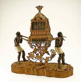 1850s Palais Royale Sedan Chair Scent Holder: 1850s "Palais Royale" vanity garniture as a royal sedan chair, brass screen and filigree elements, supported by glazed porcelain Moors (lacking one sandal) on metal and velvet covered wood base, conta