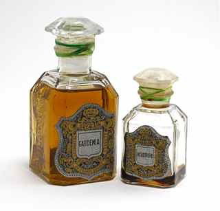 1920s 2 Guerlain Perfume Bottles: 1920s Guerlain Gardenia and Heliotrope perfume bottles and stoppers, clear glass, labels, sealed. Tallest 3 7/8 in.