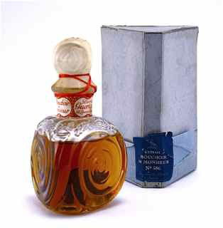 1904 Guerlain Perfume Bottle: 1904 Guerlain Mouchoir de Monsieur perfume bottle and stopper, clear glass, onionskin sealed, labels, box. 4 1/2 in.