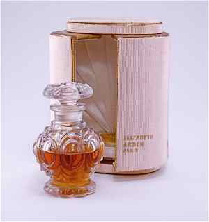 1940s Elizabeth Arden No. 450 Perfume Bottle: 1940s Elizabeth Arden No. 450 perfume bottle and stopper, clear glass, fabric box. Named for the number on Arden's opera box. 2 3/4 in.