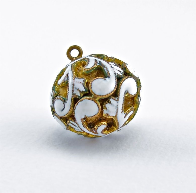 19th Century Continental Enameled Vinaigrette: 19th century Continental vinaigrette, enameled openwork gilt metal ball, stuffed with cotton wool, hanging ring. 3/4 in.