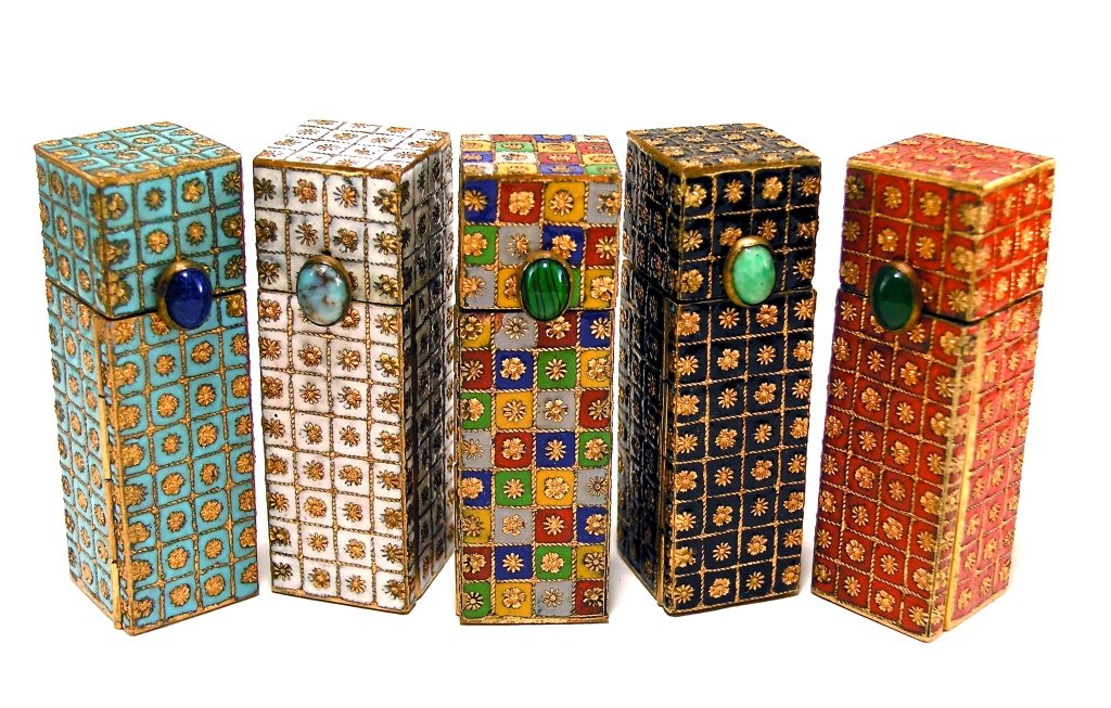1950s 5 Enameled Italian Lipsticks: 1950s Five Italian lipsticks, enameled and gilt metal, natural stone cabochon release buttons, mirrors. 2 1/4 in.