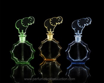 Three Curt Schlevogt Czechoslovakian perfume bottles with art deco elephant stoppers