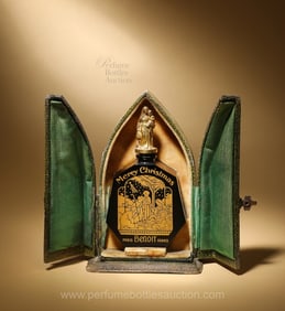 Benoit "Merry Christmas" perfume bottle with gilded nativity scene and stopper as Madonna and Child