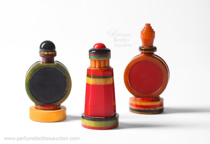 c1930 Three multicolored Bakelite Art Deco perfume bottles