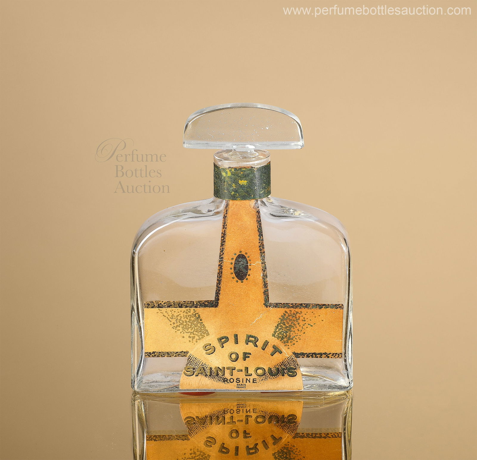 Rare 1927 Paul Poiret perfume bottle for Rosine "Spirit of Saint Louis": Rare 1927 Paul Poiret perfume bottle for Rosine Spirit of Saint Louis, clear glass, airplane shaped paper label, stopper lacking tail section label. Base label “Produced by Paul Poiret”. *Hast