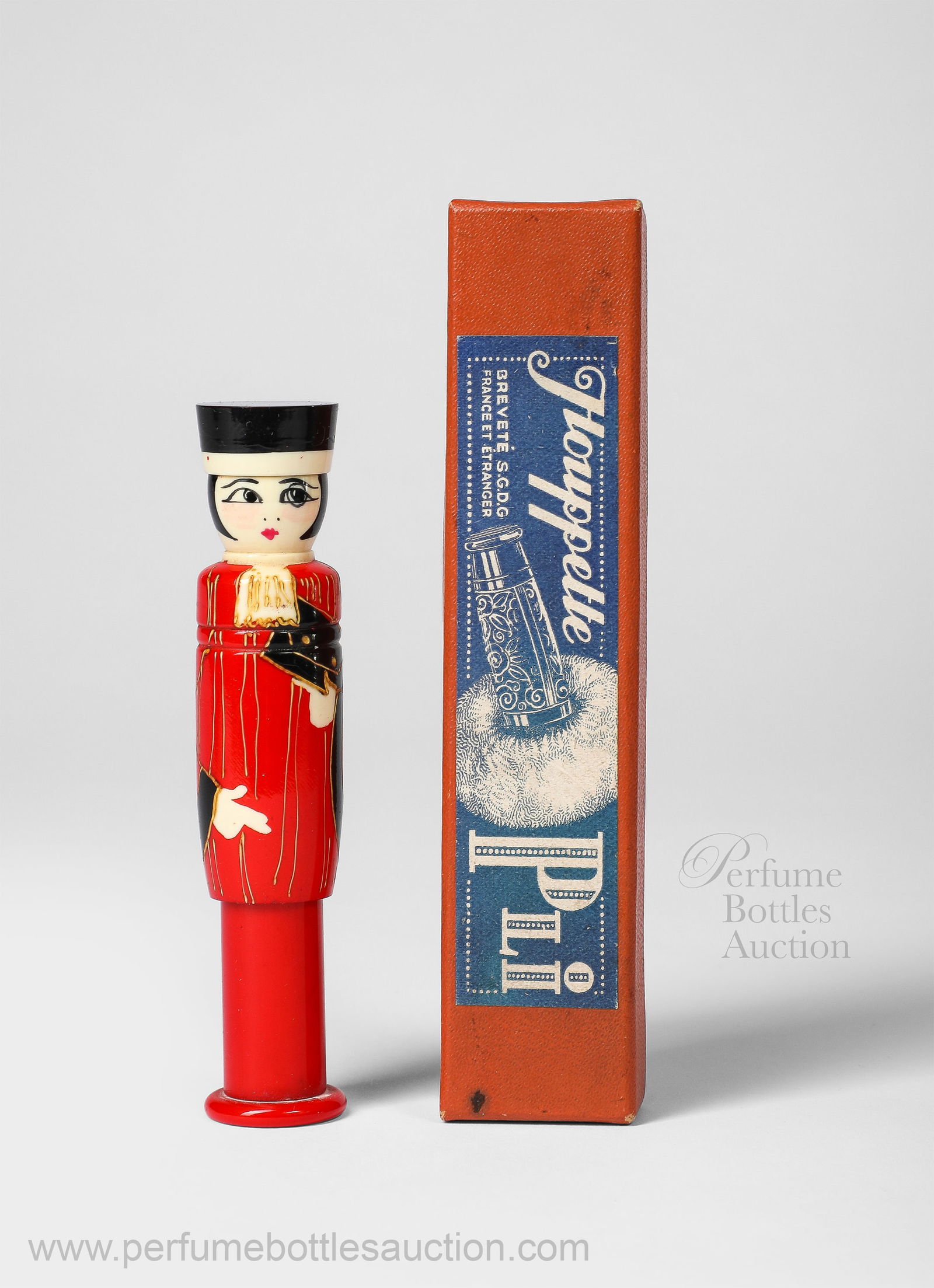 1920s Houppette “Pli” retractable swansdown powder puff, as a flapper with clutch (1 of 3)