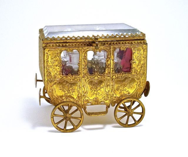 c1880 French perfume chest as a gilt metal carriage, g: c1880 French perfume chest as a gilt metal carriage, glass windows and bevel edged cover, velvet lining, 4 crystal bottles, facet stoppers. 3 1/2 in.