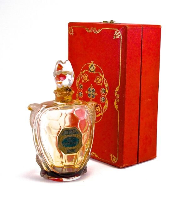 1904 Baccarat, Guerlain Parfum de Champs Elysees figura: 1904 Baccarat, Guerlain Parfum de Champs Elysees figural perfume bottle and stopper, clear/frost crystal, hand finished turtle form, grey patina, label, box. Baccarat mark. 4 1/4 in.