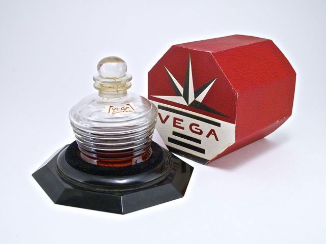 1926 Baccarat, Guerlain Vega perfume bottle and stopper: 1926 Baccarat, Guerlain Vega perfume bottle and stopper, clear crystal, cord sealed, label, box. Baccarat mark. 3 in.