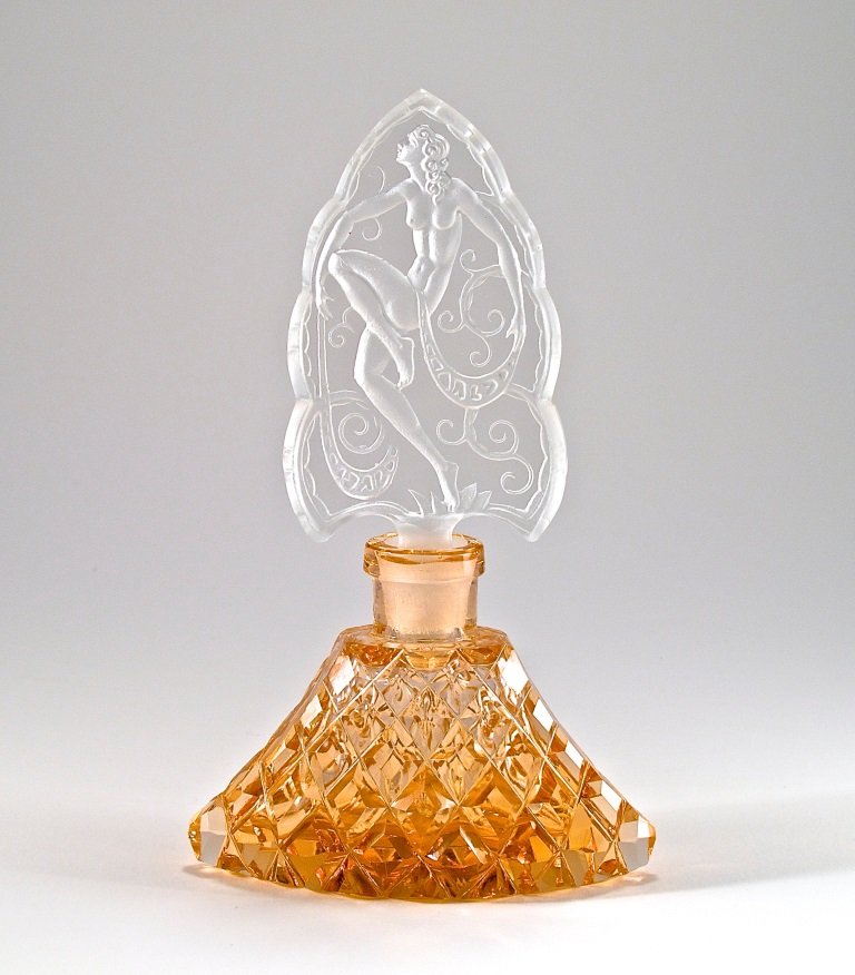 1930 Czech Pink Crystal Perfume Bottle: c1930 Czechoslovakian perfume bottle, pink crystal, clear intaglio stopper, dauber. Minor fleabites on bottle. Unmarked. 6 in.