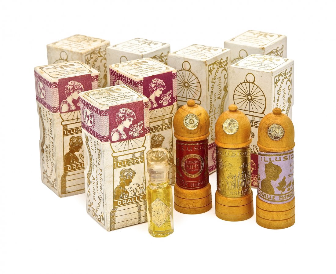 1920s Dralle,“Illusion” set of 8 floral fragrances: 1920s Dralle,“Illusion” set of 8 floral fragrances, clear glass bottles, all sealed, paper label, wooden “lighthouse” box, paper label, advertising, outer box, and cigar band label. Bottle 2 3
