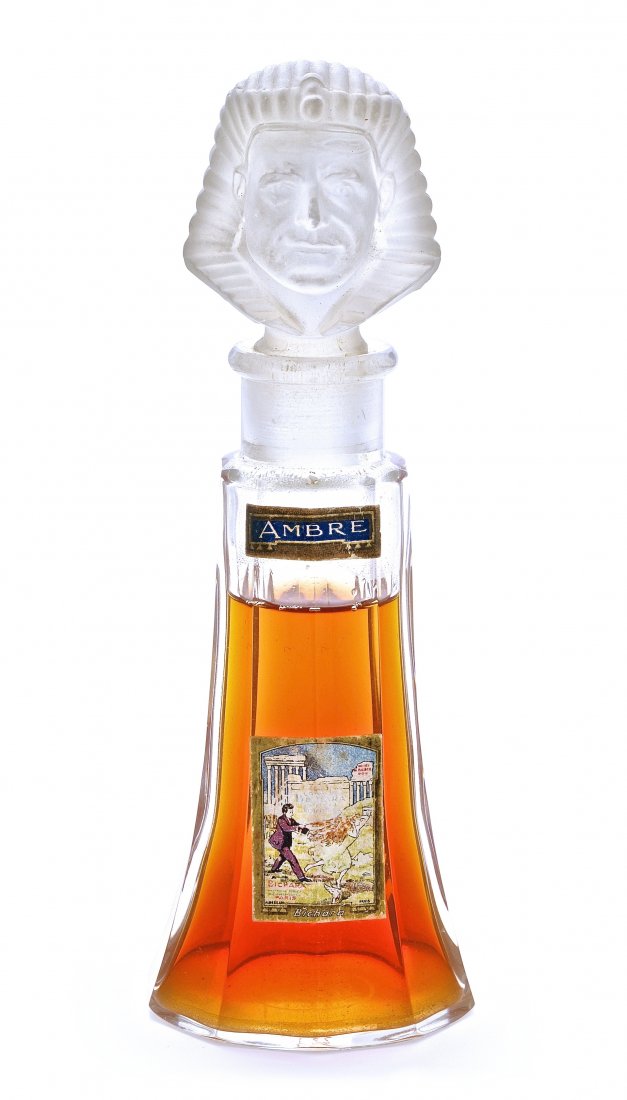 1920 Baccarat, Bichara Ambre clear crystal perfume: 1920 Baccarat, Bichara Ambre clear crystal perfume bottle, frost figural stopper, paper labels. Baccarat mark. 6 in.