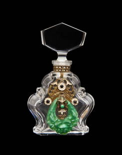 1930s Czechoslovakian perfume bottle: 1930s Czechoslovakian clear crystal perfume bottle and stopper, dauber, enameled and jeweled metal bib. MIC in lines. 3 3/4 in.