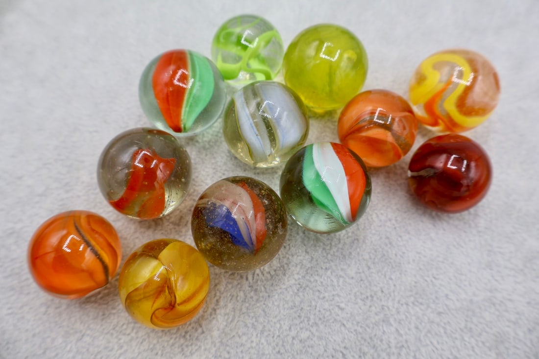 Large Grouping of Shooter Sized Cat Eye Marbles