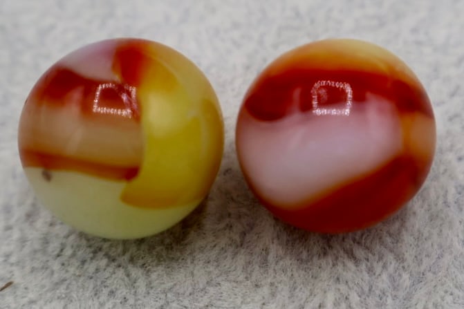 Pair of Unique Based PELTIER RAINBO Marbles: A pair of Peltier Rainbo Marbles. 1930’s Era. Unique cloudy bases. Excellent Condition. 5/8” Sized.