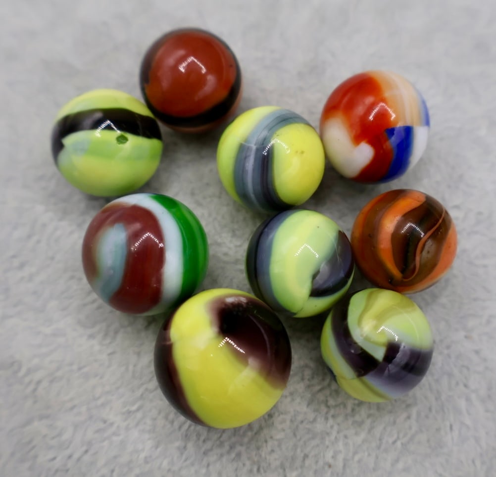 A Mixed Group of HYBRID MARBLE KING Patch Marbles: A beautiful group of varied hard to find hybrid types of Marble King type marbles. All all approximately 5/8”. Excellent condition.
