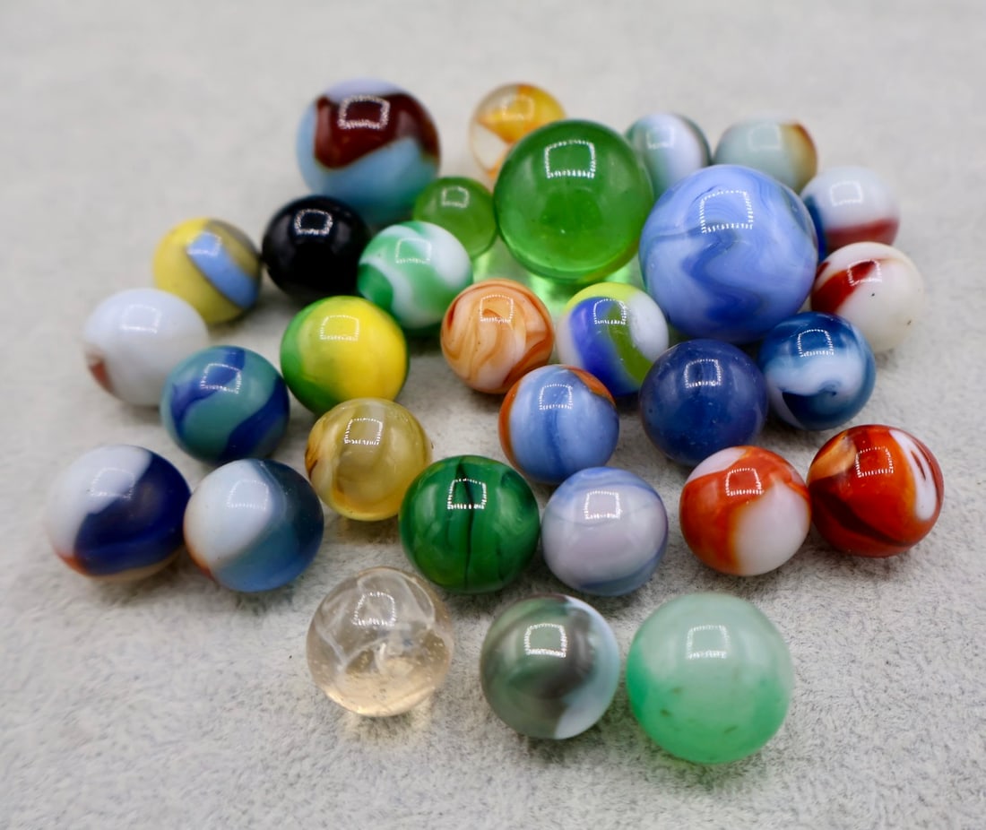 A Grouping of Various Vintage Marbles: Various makers. Various Types. Various conditions. A variety of vintage marbles from a lifelong collection. Lot 37