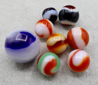 A grouping of early AKRO AGATE Vintage Corkscrew Marbles