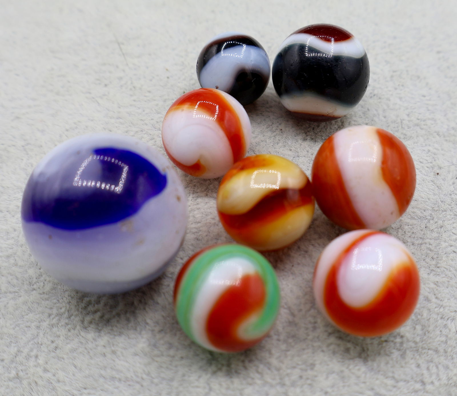 A grouping of early AKRO AGATE Vintage Corkscrew Marbles (1 of 8)
