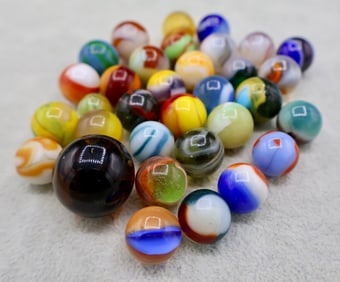 A Grouping of Various Vintage Marbles