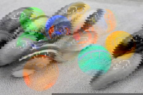 A Grouping of Various Vintage Shooter Sized Boulder Marbles: Various makers. Various Types. Various conditions. A variety of vintage marbles from a lifelong collection. Average size 1&rdquo;. Lot 75