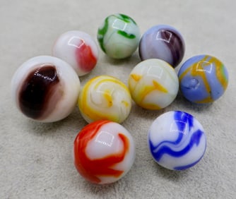 A Grouping of Various Vintage Shooter Sized Boulder Marbles