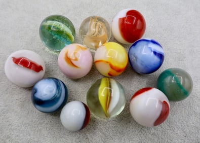 A Grouping of Various Vintage Shooter Sized Boulder Marbles