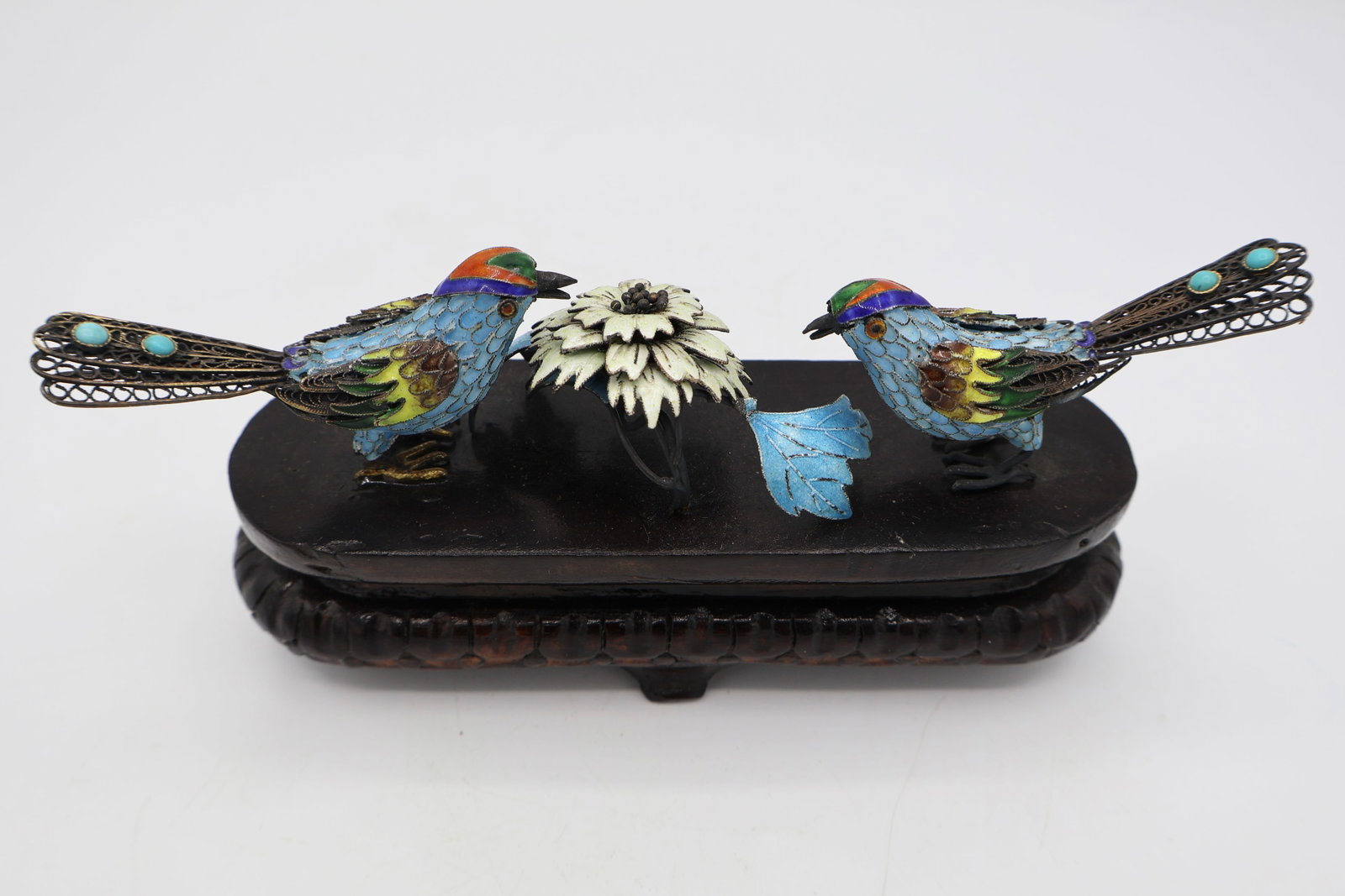 A Pair of Chinese Silver & Enamel Birds: China, early to mid 20th century. Enamel over silver. Marked on tail.
