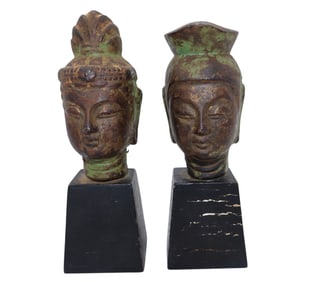 A Pair of Older Cast Chinese Buddha Heads