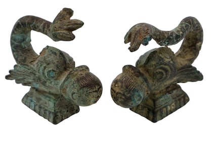 A Pair of Bronze Zoomorphic Mythological Beings