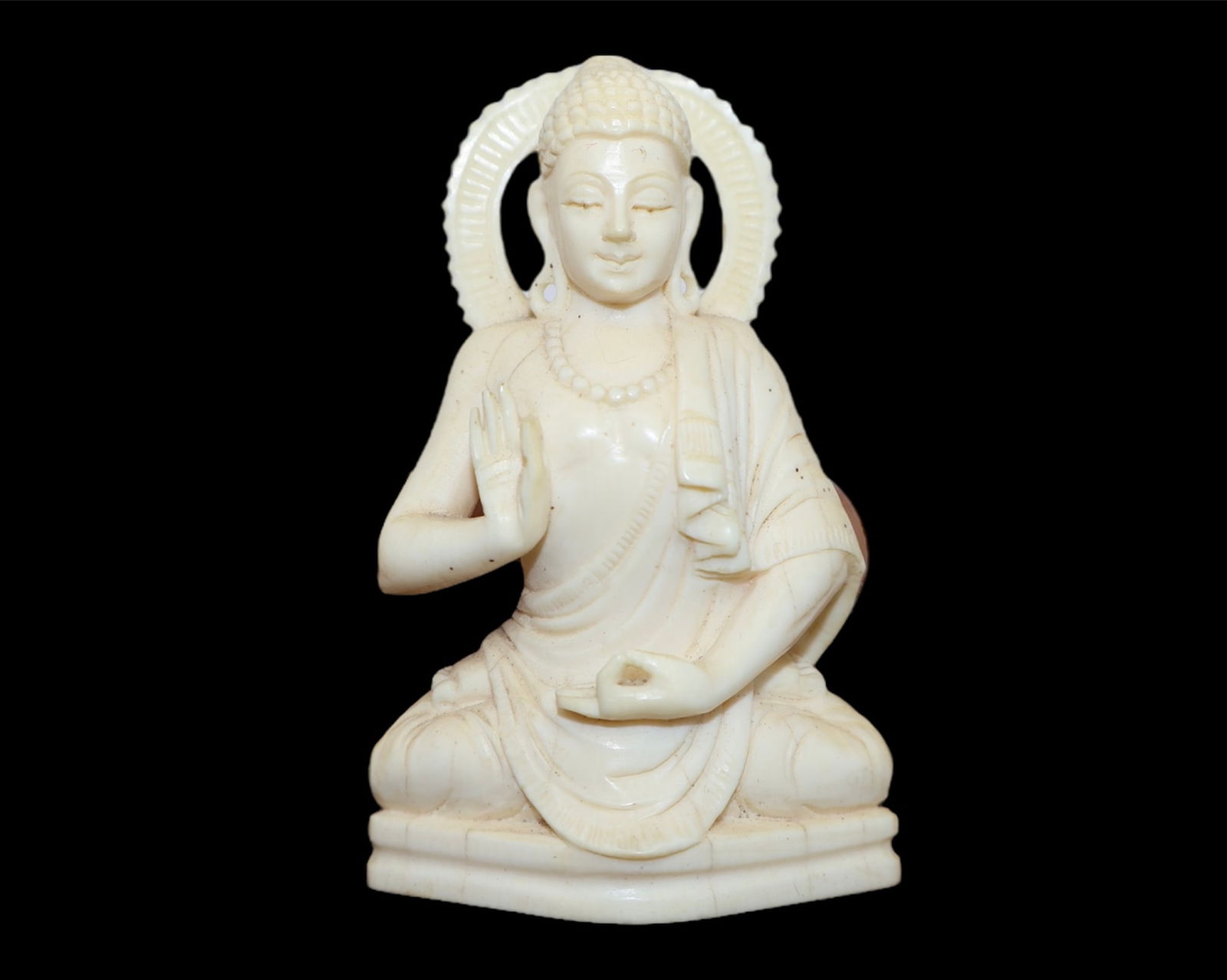 A Carved Southeastern Asian Figure of a Seated Buddha: 19th Century. Seated in meditation on lotus base. Finely carved with excellent detailing. Mounted upon a wood base. Provenance: Private Collection Florida. NO INTERNATIONAL BIDDERS. DO NOT BID IF YOUR