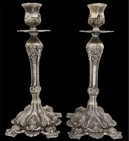A Pair of Silver Plated Candlesticks