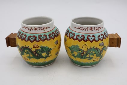 A Pair of Chinese Famille Rose Bird Feeders