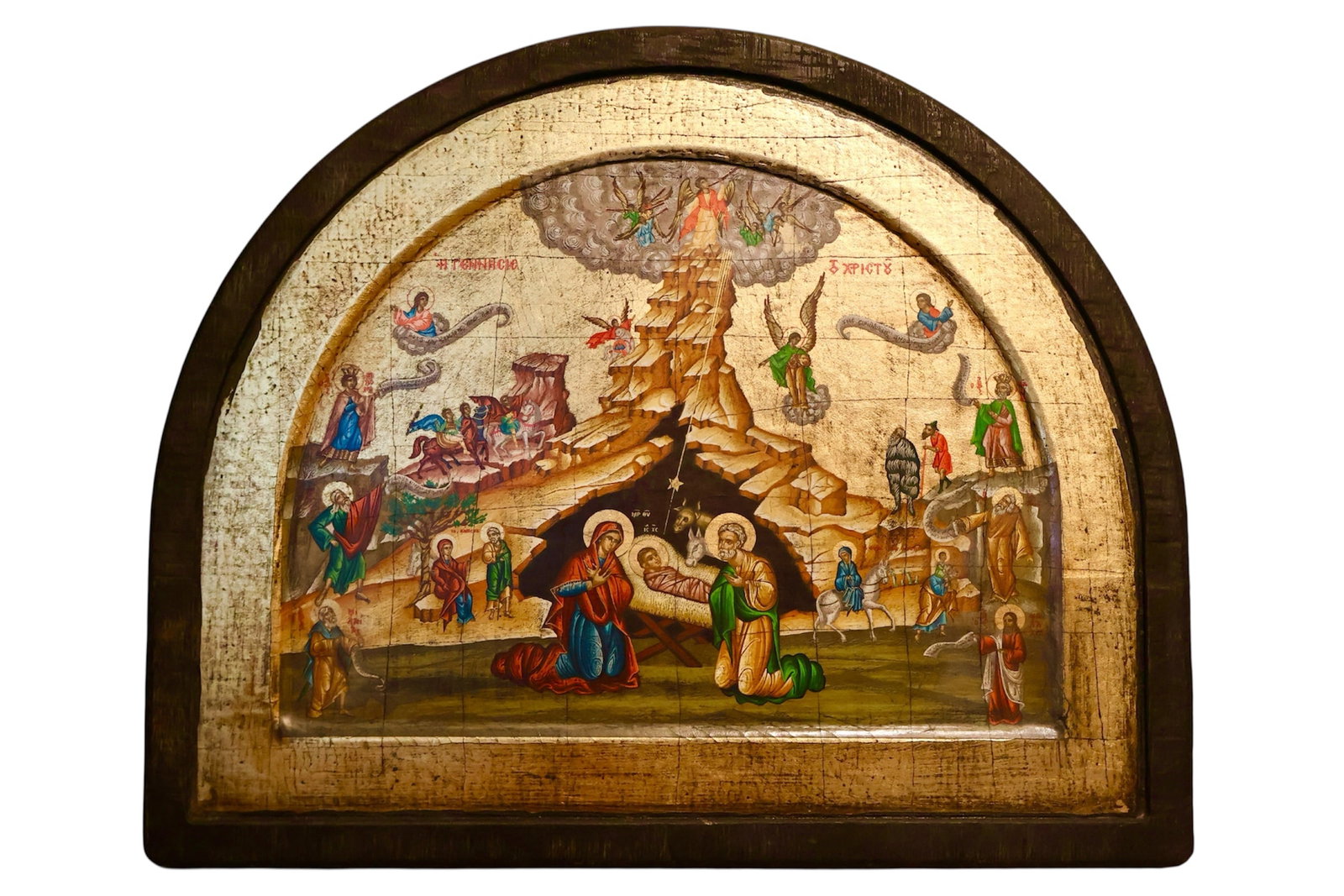 A Gold Leaf Orthodox Icon Litho on Wood: 20th century. Russian or Greek in origin. A high quality serigraph with hand applied gold leaf depicting the Birth of Jesus. Some details may be hand painted. Mounted on thick wood panel, Varnished.