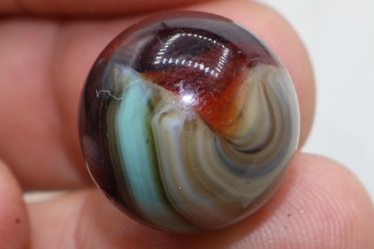 Fancy Oxblood Red Clear Base MASTER MARBLE Co. Blended Sunburst