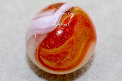 A Large Fiery Hand Gathered Single Pontil Marble
