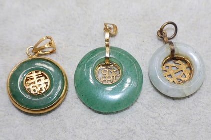 A Grouping of Green Chinese Gilt Metal Circular Bi Pi Pendants