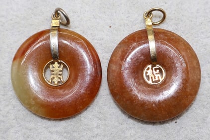 A Pair of Russet Jade Chinese Gilt Metal Circular Bi Pi Pendants