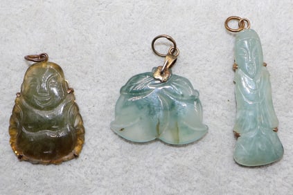 A Trio of Jade Carved Pendants